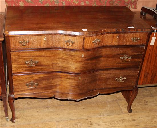 A mahogany serpentine chest, W.110cms